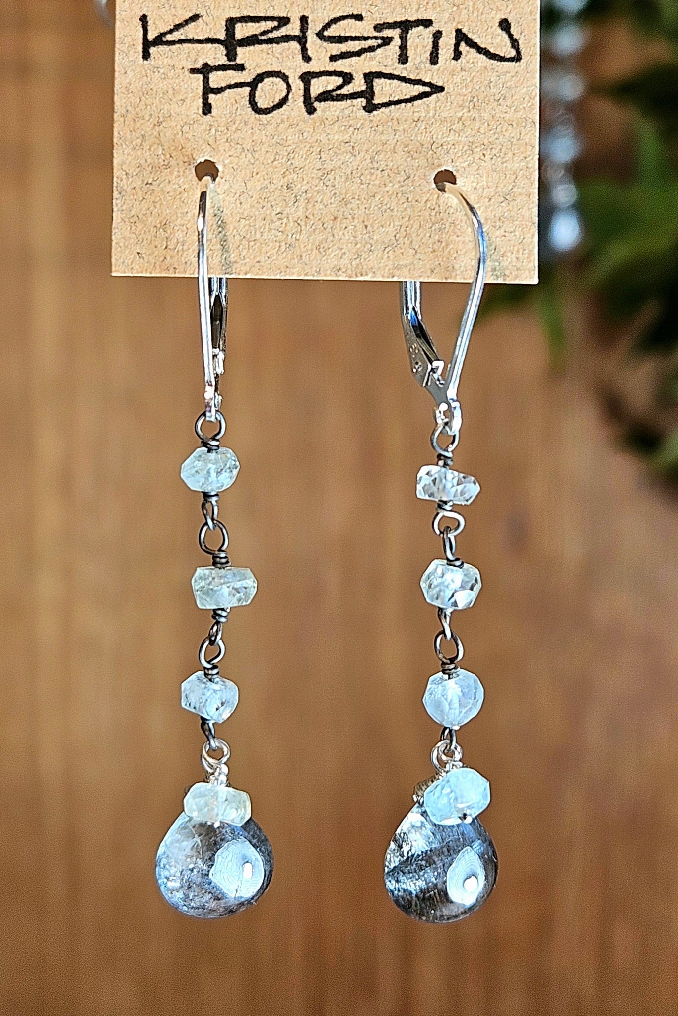 black and blue aquamarine earrings on sterling silver lever back clasps.
